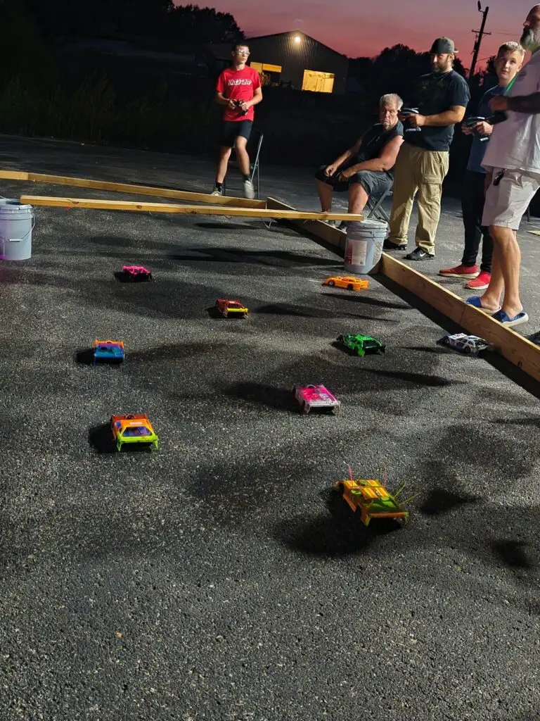 1RC cars racing on the outdoor RC track at Lanes Raceway