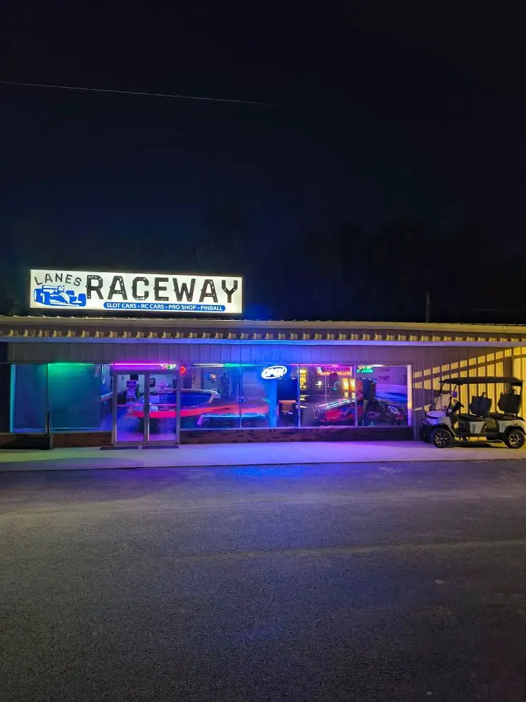 Lanes Raceway storefront at night