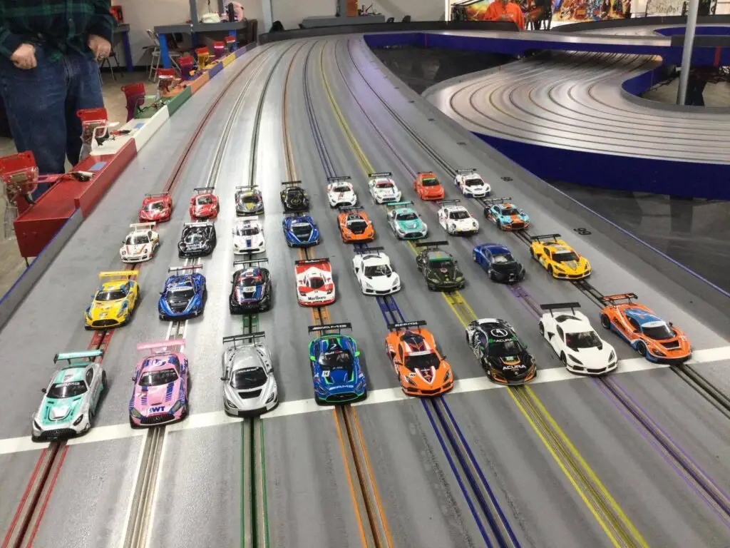 Slot cars lined up on the Lanes Raceway track